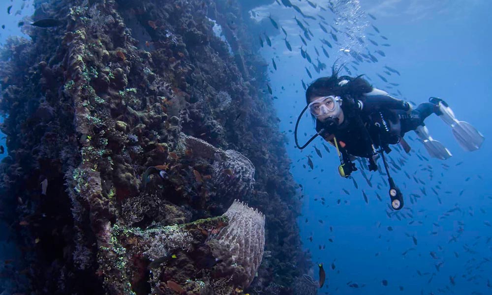 Scuba diving at USAT Liberty Wreck dive site in Tulamben, Bali